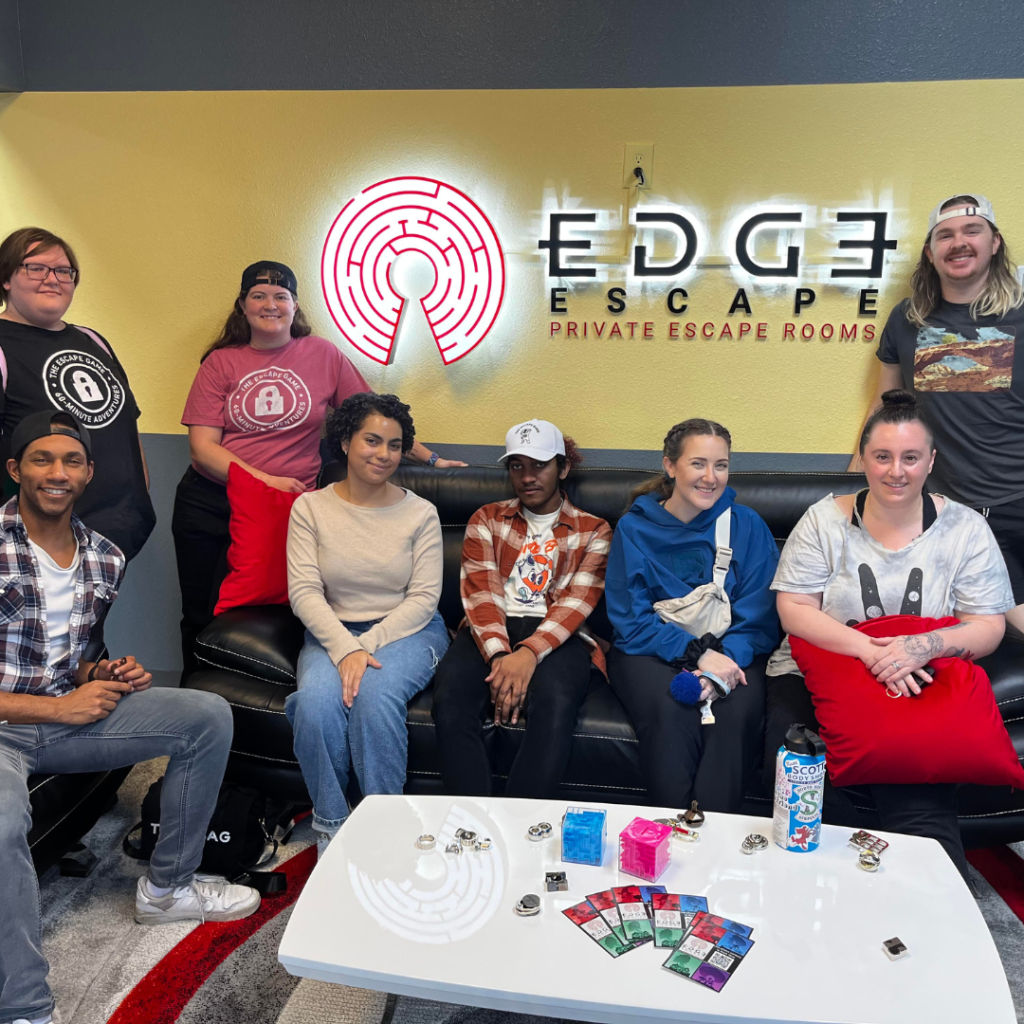 Group celebrating a special occasion at EDGE Escape Room in Winter Garden, the go-to spot for unique celebration experiences in Orange County